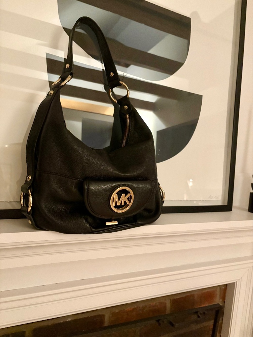 MK black leather handbag with gold hardware